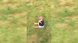 This little girl is better at crunches than me!