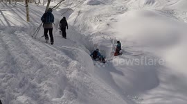Snowboarder crashes in epic fail after being warned to slow down