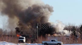 Firefighters battle raging house fire