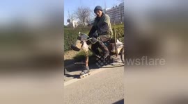 Converted tricycle uses roller skate as front wheel