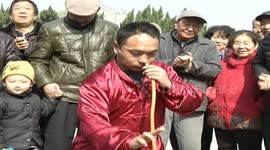 Kung fu master inflates tyre with nose
