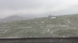 Big waves and strong winds batter Irish coast