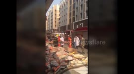 Aftermath of supermarket collapse injures two