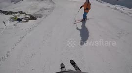 Skier spots friend stranded on the snow after checking his GoPro footage