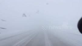 Insane Blizzard reduces visibility on highway