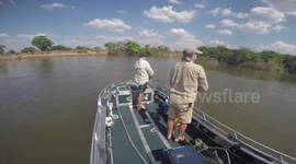 Fishing boat nearly flipped in hippo attack