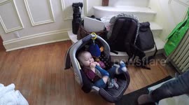 Cheeky baby won't stop pulling off and chewing on his socks