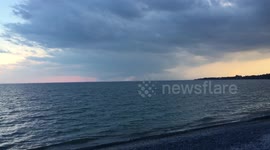 Super cell storm passes across Lake Ontario, Canada