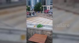 Joker belly flops down Bristol fountain steps