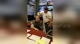 Man shaves his head in solidarity with alopecia suffering employee