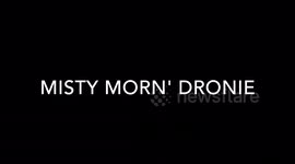 Magnificent drone footage from a dam on a misty winter day