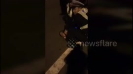 Alleged drunk driver hits on duty police officers in China