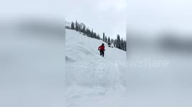 Ski instructor fails his first attempt at a front flip