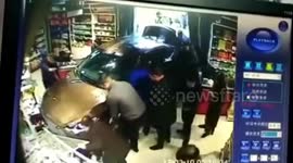 Car crashes into supermarket injuring two in central China