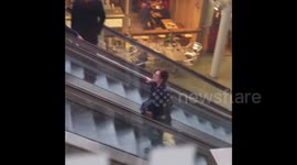 Drunk Girl Escalator Fail