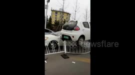 Car crashes onto central reservation in eastern China