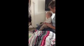 BABY REACTS TO DOG