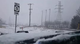 Man plows snow during Winter Storm Stella