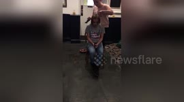Newsflare Edit - Young woman shaves her hair to honour her grandma who died of cancer
