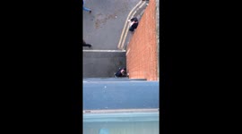 Sevilla fans urinating on buildings