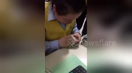 Chinese bankers show off amazing cash counting skills