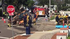 Front end loader falls into sink hole in san diego