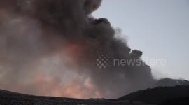Mount Etna erupts producing a continue release of volcanic ash