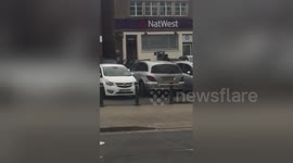 Newsflare Edit - Armed police arrest suspected Birmingham bank robber.