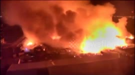 Thousands of scrapped vehicles on fire