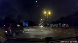 Driver blindly changing lanes on motorway. Unnecessary lane changes.