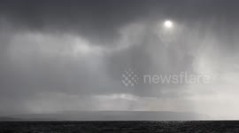 Hailstone curtains over Northern Ireland's Co Antrim Coast