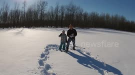 'Dronie' reveals patterns drawn by foot on snowy cornfield