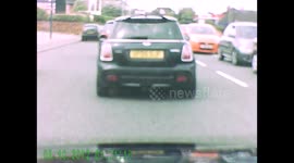 man hit by car and knocked into air