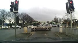 Car crashes into bollard at busy junction