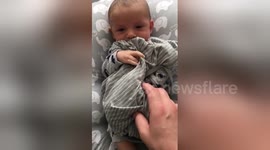 Baby stops crying when he smells mother's dirty laundry