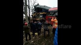 Semi-trailer collides with train injuring three in central China