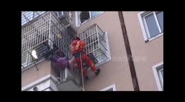 Firefighters rescue elderly woman who 'mistook balcony window for toilet door'