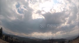 Clouds over Tatra Mountains in Poland time-lapse wide angle