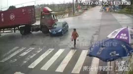 Woman narrowly escapes being crushed by car