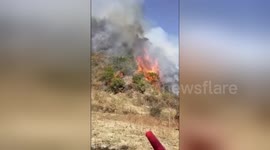 Newsflare Edit - Chinese villagers visit graves causing forest fire