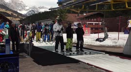 video of skiers getting on the chair lift in ski resort, 4K