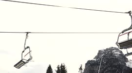 A chair lift in ski resort in Alps mountains in Sud Tirol in Italy, 4K