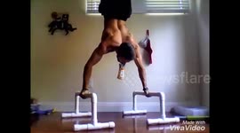 Man performs amazing 'handstand bottle flip challenge'