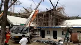 Scaffolding collapses burying 15 workers in central China