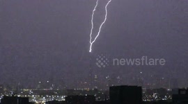 Incredible moment lightning strikes world's tallest building, Dubai's Burj Khalifa
