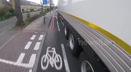 Shocking close pass on cyclist by lorry