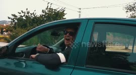 Driver tries to knock cyclist's camera off in road rage in Spain