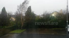 Brick Wall Crashes to Ground in Storm Winds