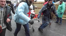 Medics Trying to Save an Injured Protester