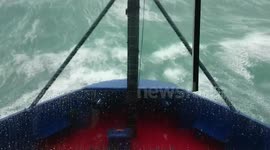 Ship batters huge waves off coast of Ireland